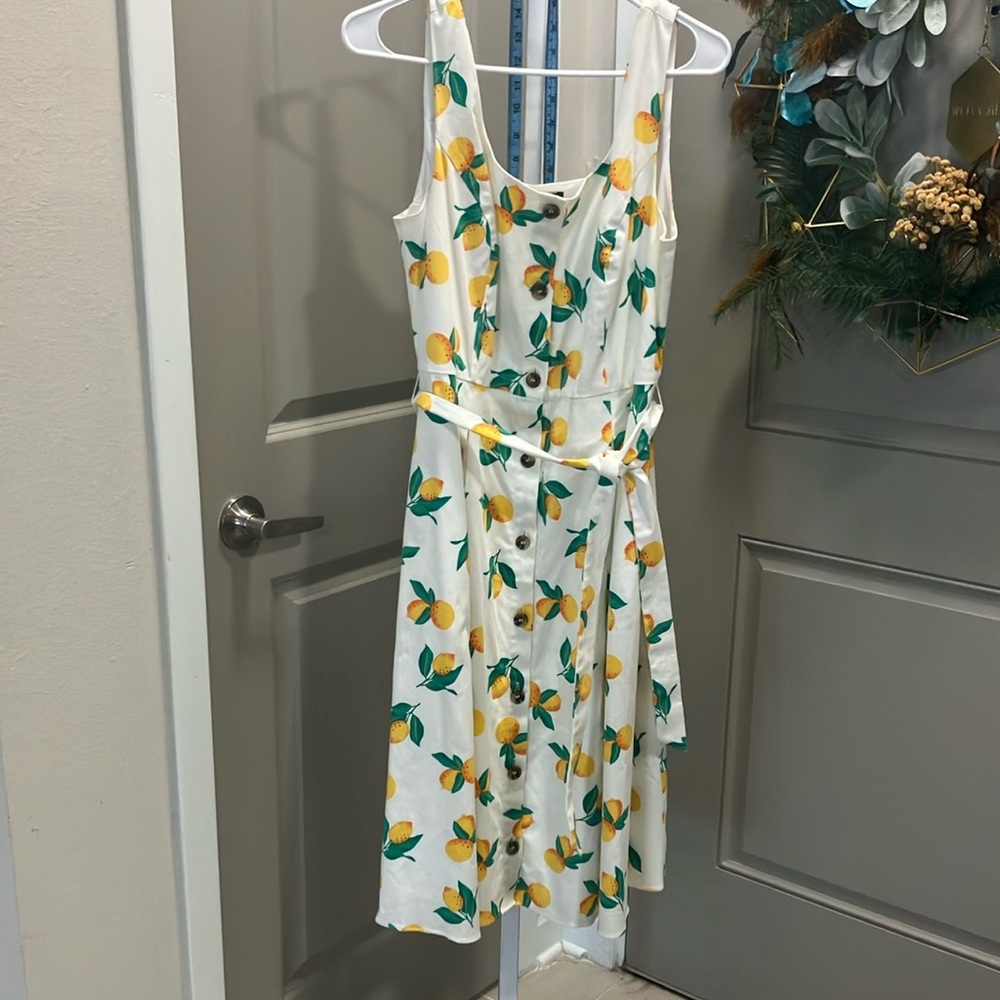 The Limited Yellow Midi Sundress with Tie Front and Sleeveless Design